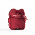 DOCTOR MI! BAG PUFFY RED praktische Kosmetiktasche in roter Steppoptik auf grauem Hintergrund 